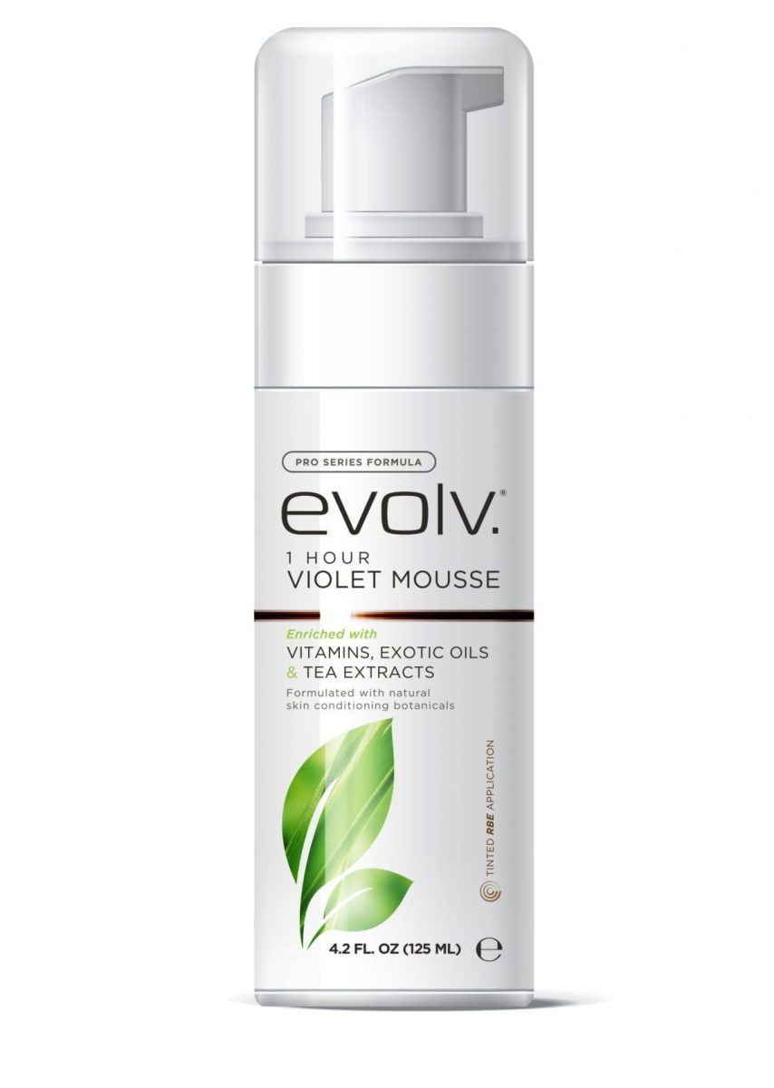 A bottle of Evolv Tan 1 Hour VM tanning solution. The bottle is sleek and cylindrical with a black cap and a white label featuring the product name and branding. The background is plain white, making the product stand out clearly